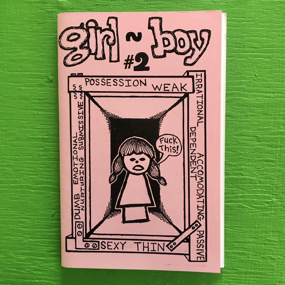 cover of Girl~Boy zine: drawing of a person with bangs and ponytails in a box