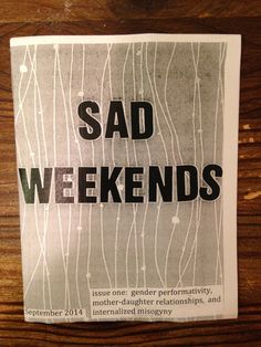 photo of zine: black all caps title on drizzly background