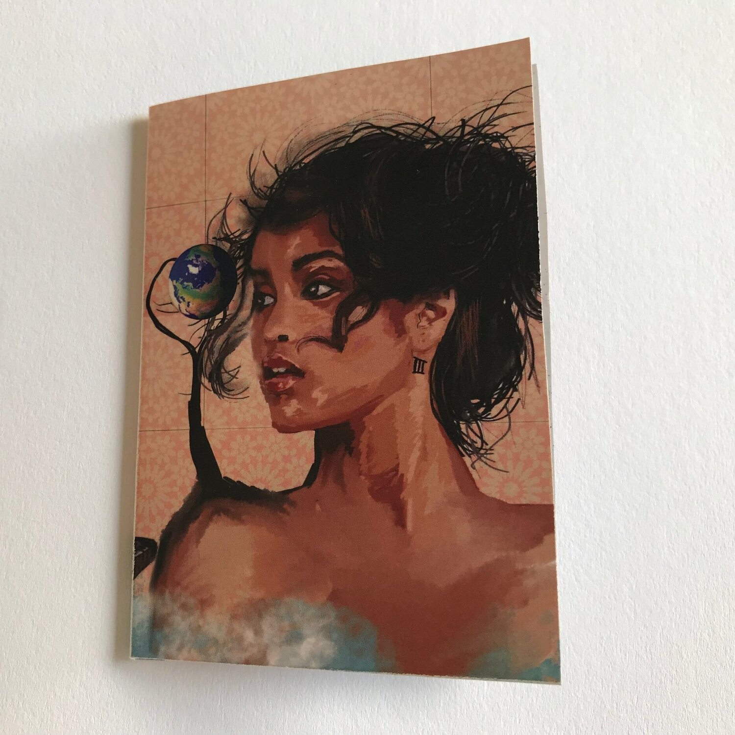 photo of zine cover: brown skinned person in profile, eyeball tree growing on their shoulder