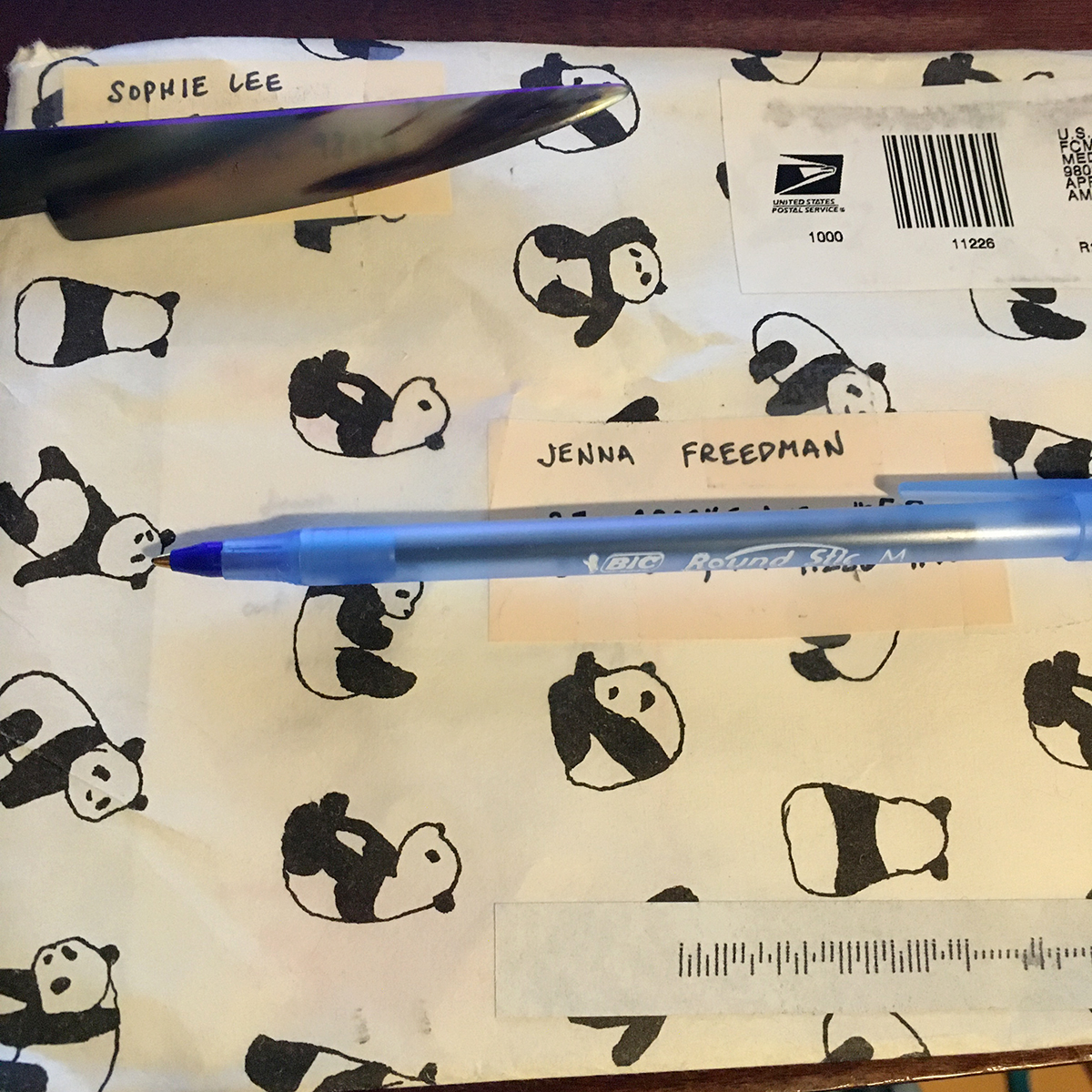 envelope made out of panda paper, return address: Sophie Lee, send to address: Jenna Freedman