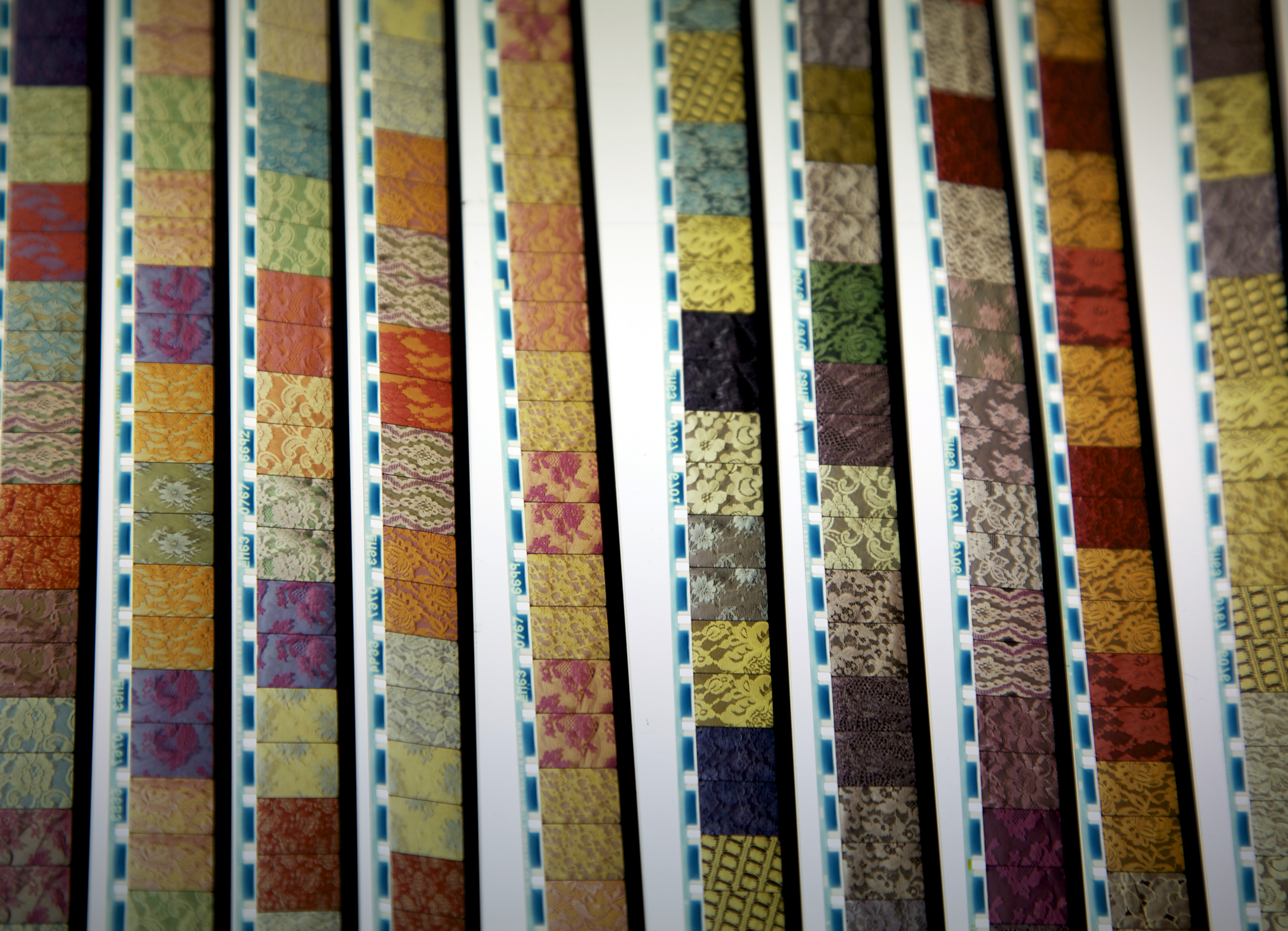 Still from Point de Glaze: Patterned materials layered on top of each other.