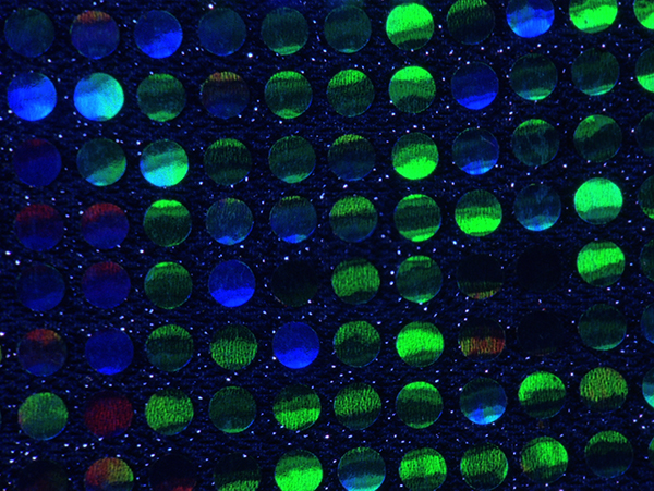 Razzle Dazzle Still: Rows of blue and green iridescent circles 